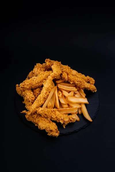 Closeup Shot Tasty Looking Dish Fried Chicken Fries Isolated Black — Stock Photo, Image