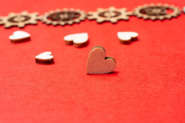Selective Focus Shot Wooden Heart Figures Red Surfa — Stock Photo, Image