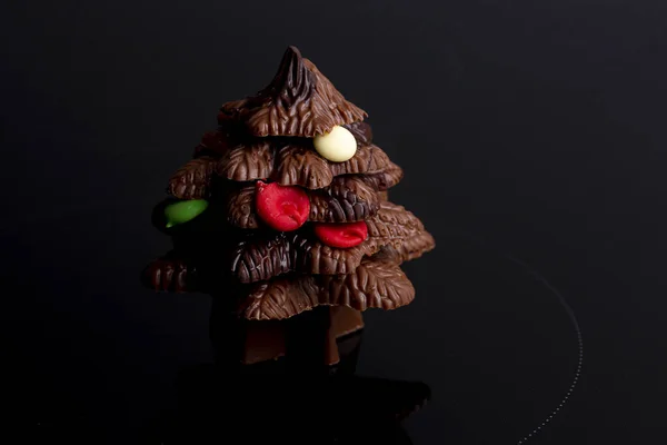 Low Key Chocolate Christmas Tree Candy Decoration Black Background — Stock Photo, Image