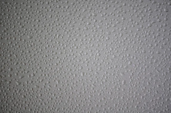 灰色の表面のきれいな水滴 壁紙のために良い — ストック写真