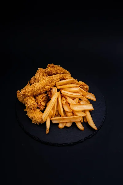 Closeup Shot Tasty Looking Dish Fried Chicken Fries Isolated Black — Stock Photo, Image