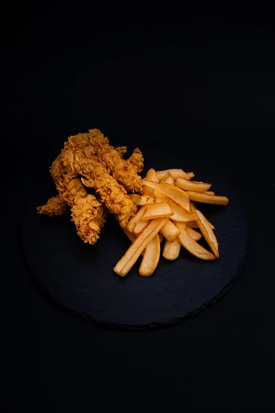 Closeup Shot Tasty Looking Dish Fried Chicken Fries Isolated Black — Stock Photo, Image