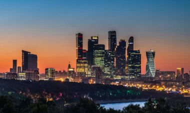 A landscape of modern skyscrapers of the Moscow International Business Center in the evening in Russia clipart