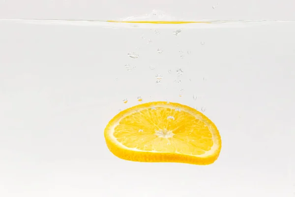 Lemon Slice Floating Water White Background — Stock Photo, Image