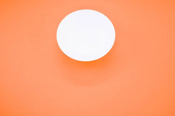 Overhead Shot Empty White Glass Bowl Orange Background — Stock Photo, Image