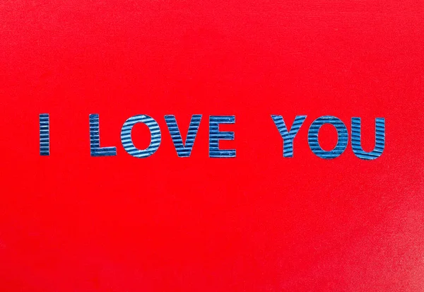 Una Vista Superior Ortografía Letra Azul Amo Una Superficie Roja — Foto de Stock