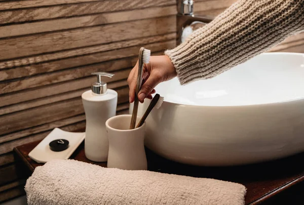 Female Hand Taking Toothbrush Bathroom — Stock Photo, Image