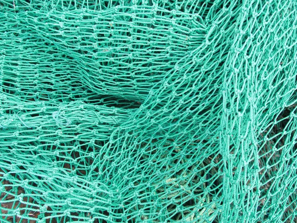 Zbliżenie Ujęcia Niebiesko Zielonej Sieci Rybackiej — Zdjęcie stockowe