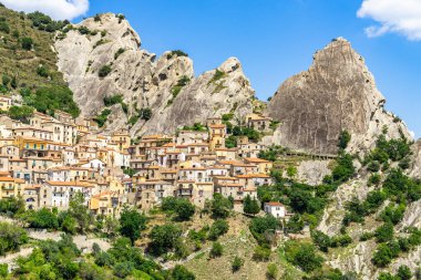 Castelmezzano is beautiful village in Basilicata region among the peaks of the Dolomiti lucane, Italy clipart