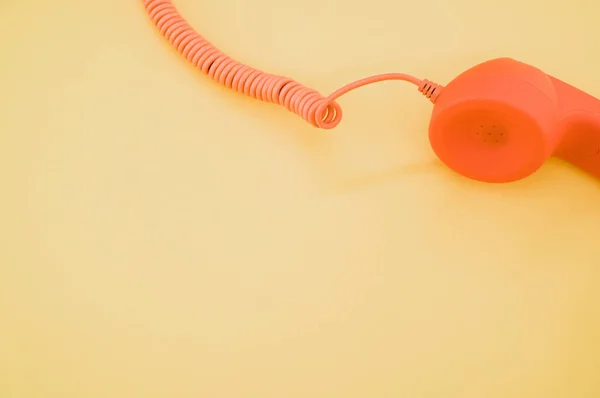 Bild Orange Telefon Den Beige Bakgrunden — Stockfoto