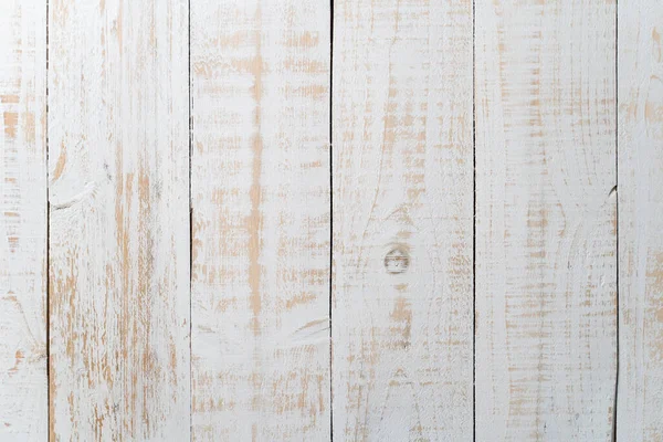A closeup of a white wooden plank