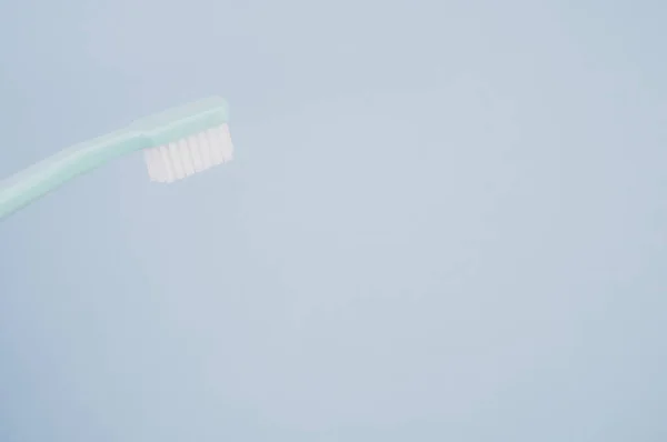 Cepillo Dientes Azul Sobre Fondo Azul Pastel Con Espacio Copia — Foto de Stock