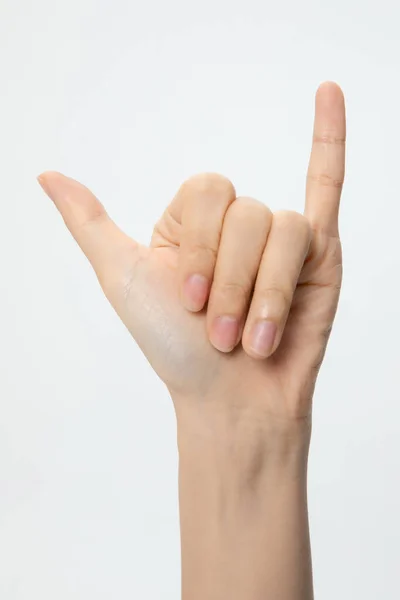 Ett Vertikalt Skott Hand Gester Shaka Symbolen Isolerad Vit Bakgrund — Stockfoto