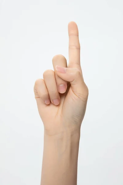 Disparo Vertical Una Mano Haciendo Gesto Aislado Sobre Fondo Blanco — Foto de Stock