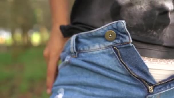 Shallow Focus Female Taking Her Jeans Shirt Forest Sunlight Shot — Stock Video