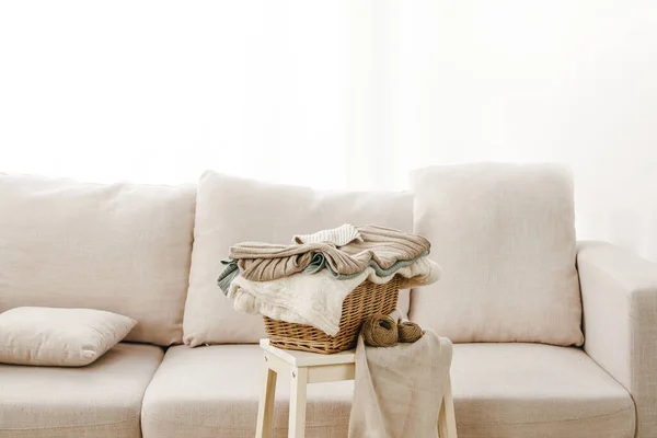 Closeup Gray Sofa Basket Folded Clothes Small Table — Stock Photo, Image