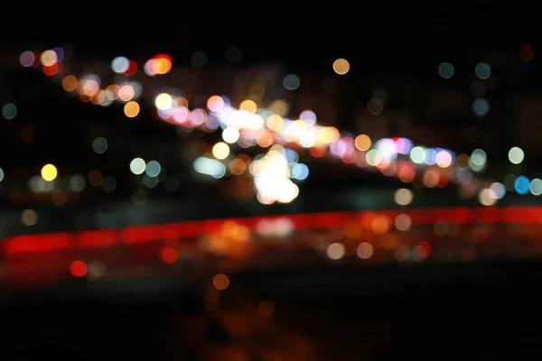 都会の夜の光ボケのぼやけたショット 壁紙や背景のための素晴らしい — ストック写真