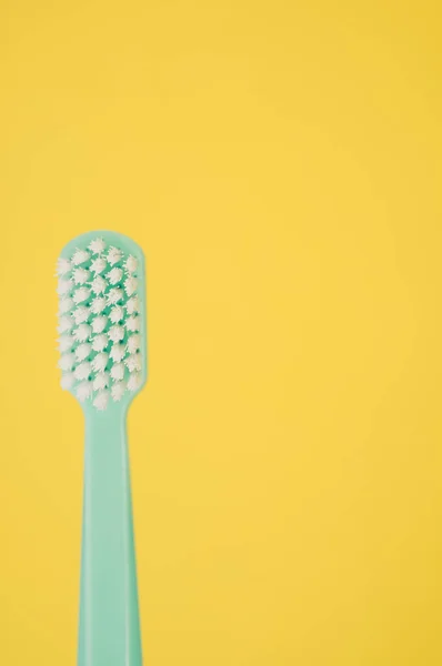 Vertical Shot Toothbrush Isolated Yellow Background Empty Space Text — Stock Photo, Image