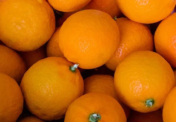Molti Frutti Mandarino Appena Raccolti Con Foglie Verdi Come Sfondo — Foto Stock