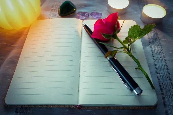 Rose Pen Book White Cloth Warm Candlelight Small Lights — Stock Photo, Image