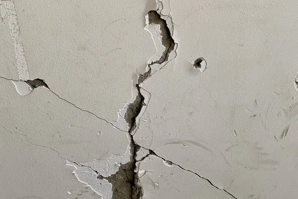 汚れたコンクリートの壁のパターンの背景のクローズアップショット — ストック写真