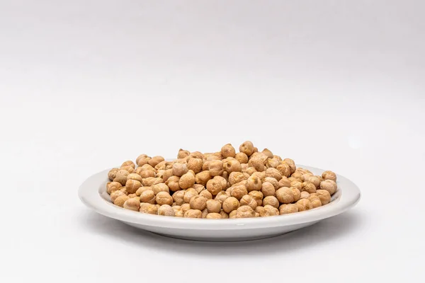 Closeup Shot Plate Chickpeas Isolated White Background — Stock Photo, Image