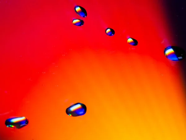 Close Water Drops Red Orange Colored Surface — Stock Photo, Image