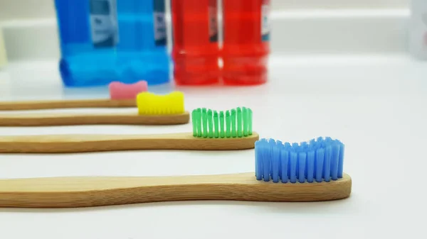 Closeup Shot Colorful Bamboo Toothbrushes White Surface — Stock Photo, Image