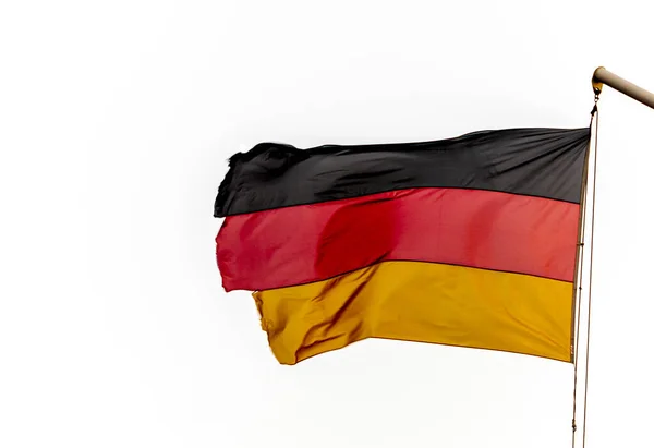 Hullámzó Német Zászló Megrongálódott Szél Fehér Háttér — Stock Fotó