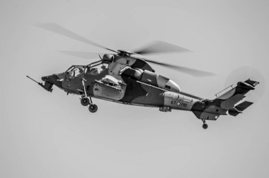 BARCELONA, SPAIN - Aug 07, 2017: Black and white photo of armed spanish army helicopter. Eurocopter EC665 Tiger clipart