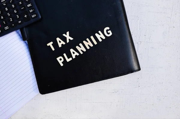 Una Vista Superior Una Calculadora Papeles Cuaderno Con Planificación Fiscal — Foto de Stock