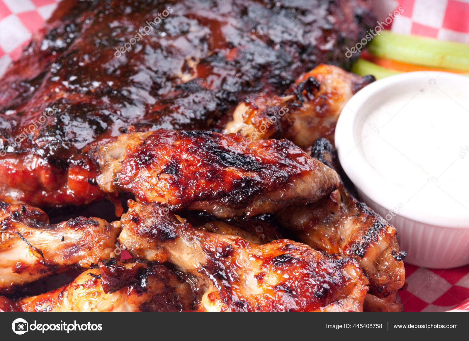 Bbq Half Rack Ribs Pound Wings Stock Photo by ©Wirestock 445408758