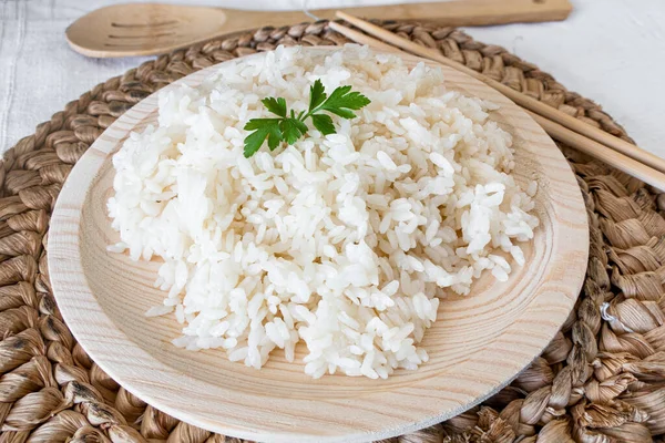 Closeup Shot Cooked Rice Wooden Plate Some Parsley Leaves Wooden — Stock Photo, Image