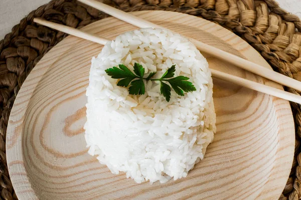 Top View Cooked Rice Wooden Plate Some Parsley Leaves Wooden — Stock Photo, Image