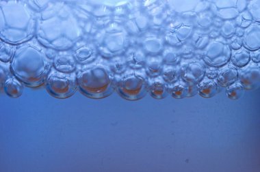 A macro shot of bubbles of a micellar water clipart