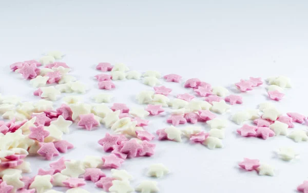 Closeup Shot Pink White Star Sprinkles White Surface — Stock Photo, Image