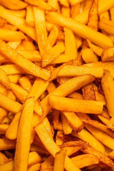 Verticaal Schot Van Vette Friet Aardappelen Achtergrond — Stockfoto