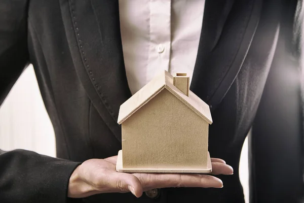 Closeup Businesswoman Holding Small Wooden House Real Estate Concpt — Stock Photo, Image