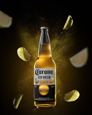 Pictured you can see a container of crown beer on a dark background clipart