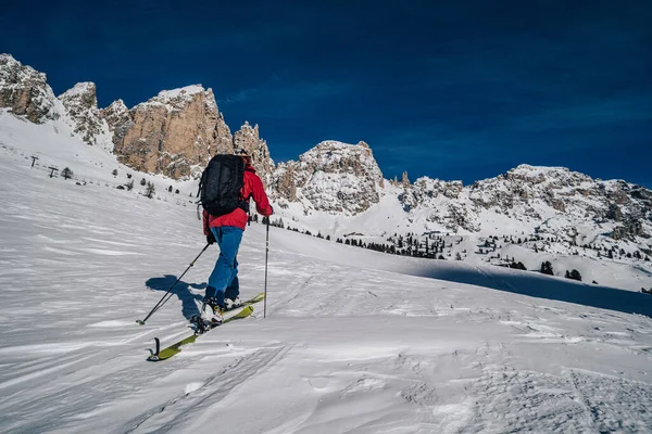 Ski touring in Dolomites, Italy. Skialpinism, touring on skis in winter wonderland of South Tyrol, Dolomites, Italy. Alto Adige, Gardena Pass.