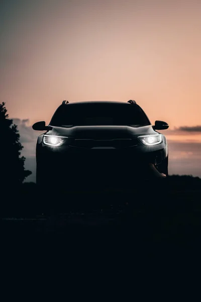 Vertical Shot Black Car Sunset — Stock Photo, Image