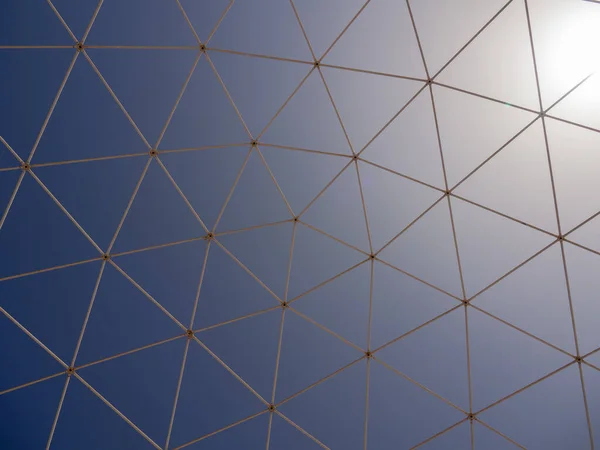 An artificial semisubmersible geodesic dome in the blue sky background in Fuerte Ventura, Canary Islands