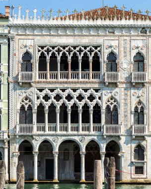 Facade of the Ca d'Oro (in Italian Golden House or Palazzo Santa Sofia) overlooking the Gran Canal, Venice, Italy  clipart