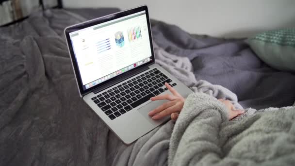 Young Woman Does Online Shopping Laptop Bed — Stock Video