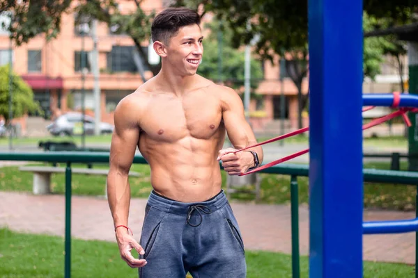 Hot Young Muscular Man Working Out Horizontal Bars — Stock Photo, Image