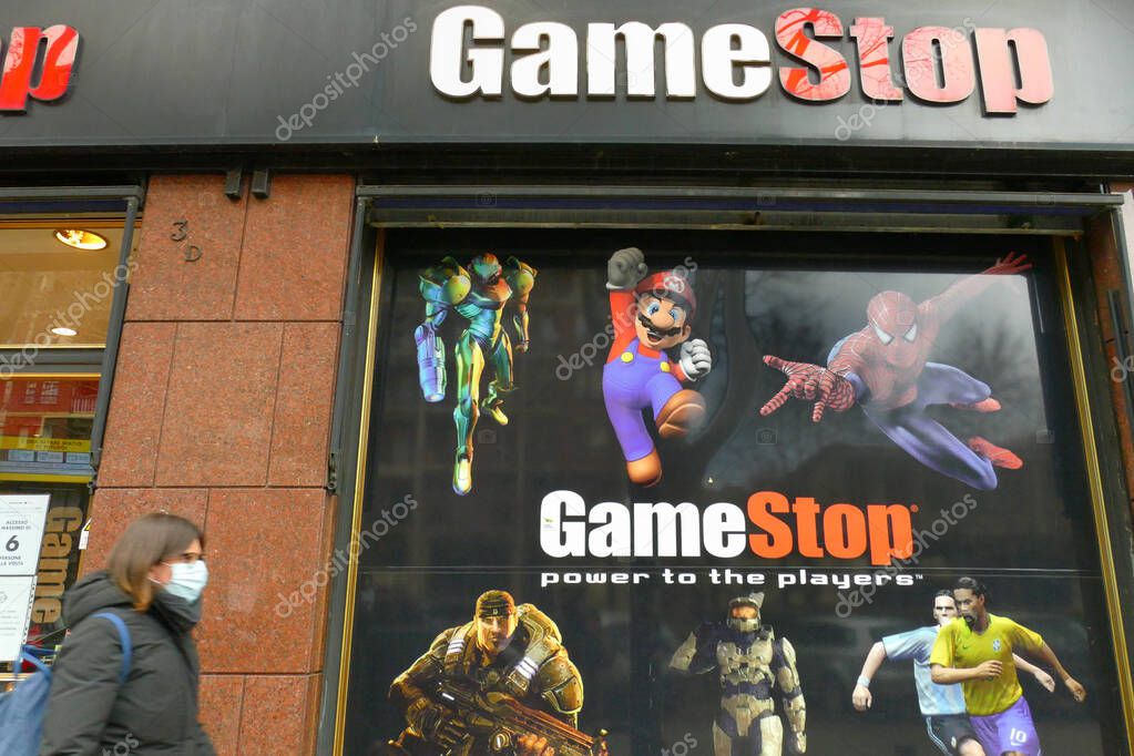TURIN, ITALY - Feb 09, 2021: Game Stop video gaming retail shop exterior view and signboard logo