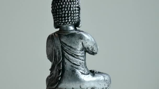 Closeup View Statue Buddha Rotating Gray Background — Stockvideo