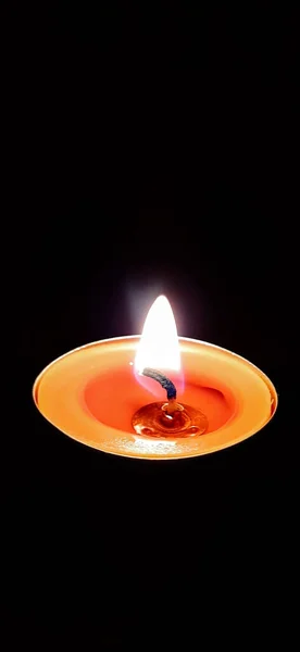 Close Vertical Shot Atmospheric Candle Burning Black Background — Stock Photo, Image