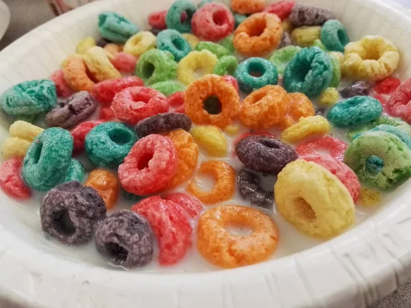 Colorful breakfast cereals in milk