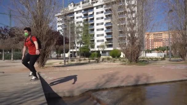 Excited Spanish Man Face Mask Enjoying Outdoors While Walking Happily — Vídeos de Stock